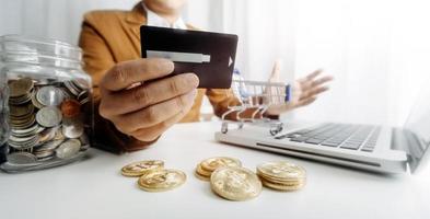 Woman hand using mobile smart phone, online payment, banking and online shopping at the home. photo