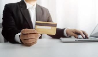 Woman hand using mobile smart phone, online payment, banking and online shopping at the home. photo