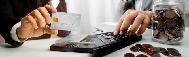 Woman hand using mobile smart phone, online payment, banking and online shopping at the home. photo