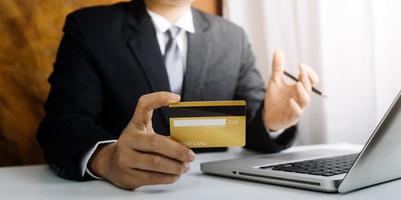 Woman hand using mobile smart phone, online payment, banking and online shopping at the home. photo