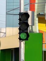 traffic light with green color on photo