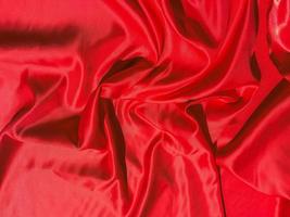Red fabric texture for backgroundwith coy space. Valentines Day or Christmas Day wallpaper design photo