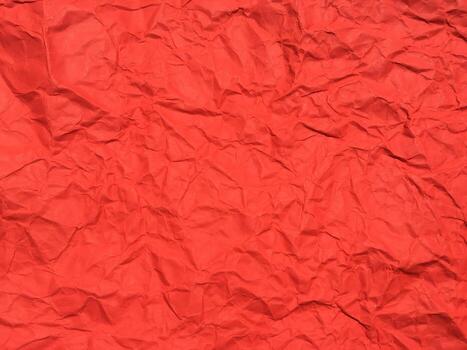 Red crumpled paper texture background for Design. Wallpaper  for copy space photo
