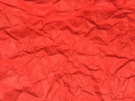 Red crumpled paper texture background for Design. Wallpaper  for copy space photo