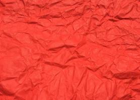 Red crumpled paper texture background for Design. Wallpaper  for copy space photo