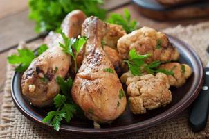 Chicken leg with baked cauliflower and parsley