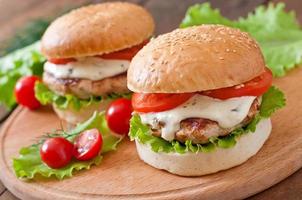 Appetizing hamburger with chicken burger and sauce Tartar photo