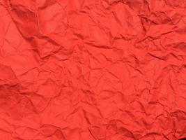 Red crumpled paper texture background for Design. Wallpaper  for copy space photo