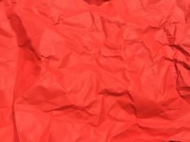 Red crumpled paper texture background for Design. Wallpaper  for copy space photo