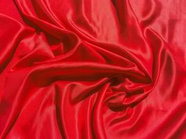 Red fabric texture for backgroundwith coy space. Valentines Day or Christmas Day wallpaper design photo