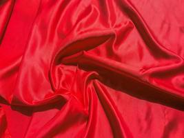 Red fabric texture for backgroundwith coy space. Valentines Day or Christmas Day wallpaper design photo