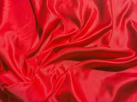 Red fabric texture for backgroundwith coy space. Valentines Day or Christmas Day wallpaper design photo