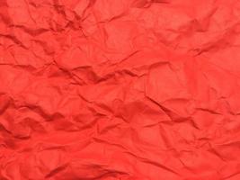 Red crumpled paper texture background for Design. Wallpaper  for copy space photo