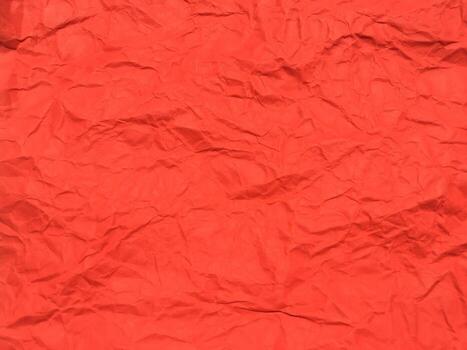 Red crumpled paper texture background for Design. Wallpaper  for copy space photo