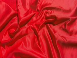 Red fabric texture for backgroundwith coy space. Valentines Day or Christmas Day wallpaper design photo