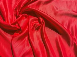 Texture of red Wrinkles fabric for background. Valentines Day or Christmas Day wallpaper design photo