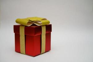 red gift box  on light background photo