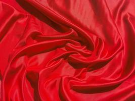 Red fabric texture for backgroundwith coy space. Valentines Day or Christmas Day wallpaper design photo