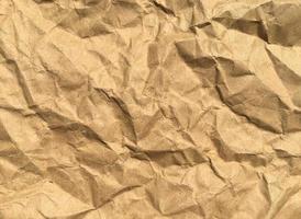 Brown wrinkle recycle paper background for Design. Blank  surface for text or work photo