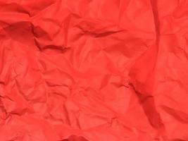 Red crumpled paper texture background for Design. Wallpaper  for copy space photo