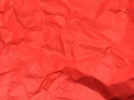 Red crumpled paper texture background for Design. Wallpaper  for copy space photo