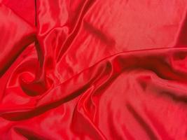 Red fabric texture for backgroundwith coy space. Valentines Day or Christmas Day wallpaper design photo