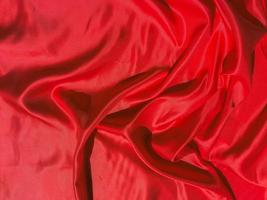 Red fabric texture for backgroundwith coy space. Valentines Day or Christmas Day wallpaper design photo