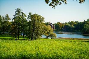 An impressive autumn landscape on a sunny day. Lake in sunlight. Amazing day in photo