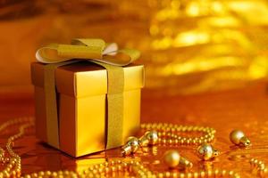 golden gift box on shiny background