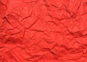 Red crumpled paper texture background for Design. Wallpaper  for copy space photo