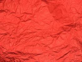 Red crumpled paper texture background for Design. Wallpaper  for copy space photo