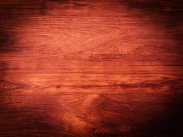 Walnut planks texture for background with space for work. Top view photo