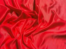 Red fabric texture for backgroundwith coy space. Valentines Day or Christmas Day wallpaper design photo