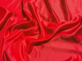 Red fabric texture for backgroundwith coy space. Valentines Day or Christmas Day wallpaper design photo