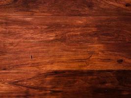 Walnut planks texture for background with space for work. Top view photo