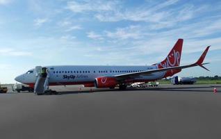 Zaporozhye,  Zaporozhye region,  Ukraine, 2021  - Boeing 737,  airline Sky Up which flew in from Egypt with attendants.  Plane landed  on the  takeoff  field  of  the  terminal  Zaporozhye airport. photo