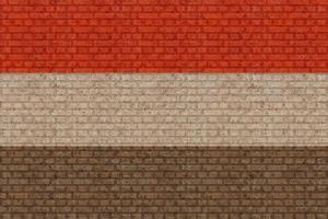 3D Flag of Yemen on brick wall photo