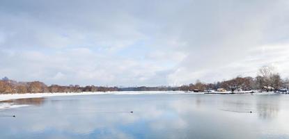 cold river and blue cloudy sky photo