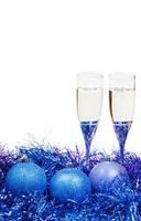 glasses of wine at blue and violet Xmas tinsel photo