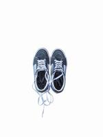 object photo of a pair of blue shoes and black footwear on a white background, photo of shoes isolated white background