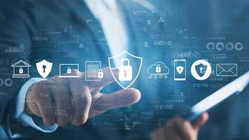 Cybersecurity and privacy concepts to protect data. Lock icon and internet network security technology. Businessmen protecting personal data on virtual interfaces. photo