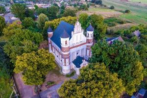 aerial view on baroque temple or catholic church in countryside photo