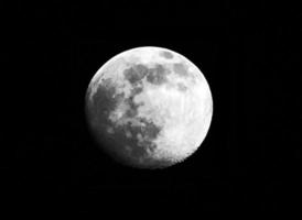 The surface of the moon with craters photo