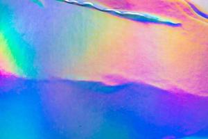 Crumpled Holographic rainbow foil iridescent texture abstract hologram background photo