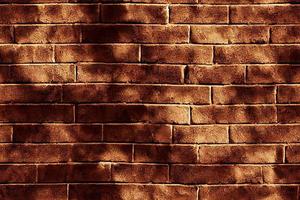 Seamless pattern. Aged, weathered red brick wall. Repeatable background, wallpaper, backdrop with shadows photo