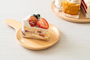 strawberry fresh cream cake on plate photo