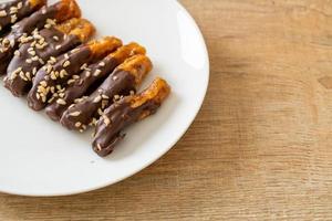 banana chocolate coating or banana dipped chocolate photo