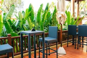 empty outdoor patio deck and chair photo