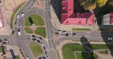 accelerated video 4x aerial view above on road junction with heavy traffic in city