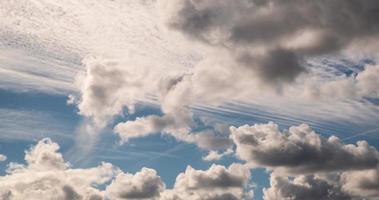 4k timelapse iridescent different layers of clouds in the blue sky video